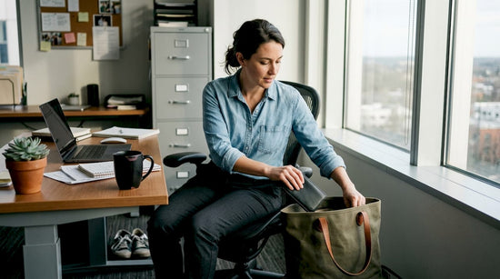 Professional retrieving RFID wallet in office