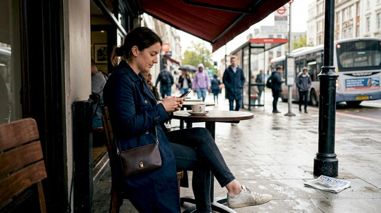 Urban commuter with secure crossbody bag at café